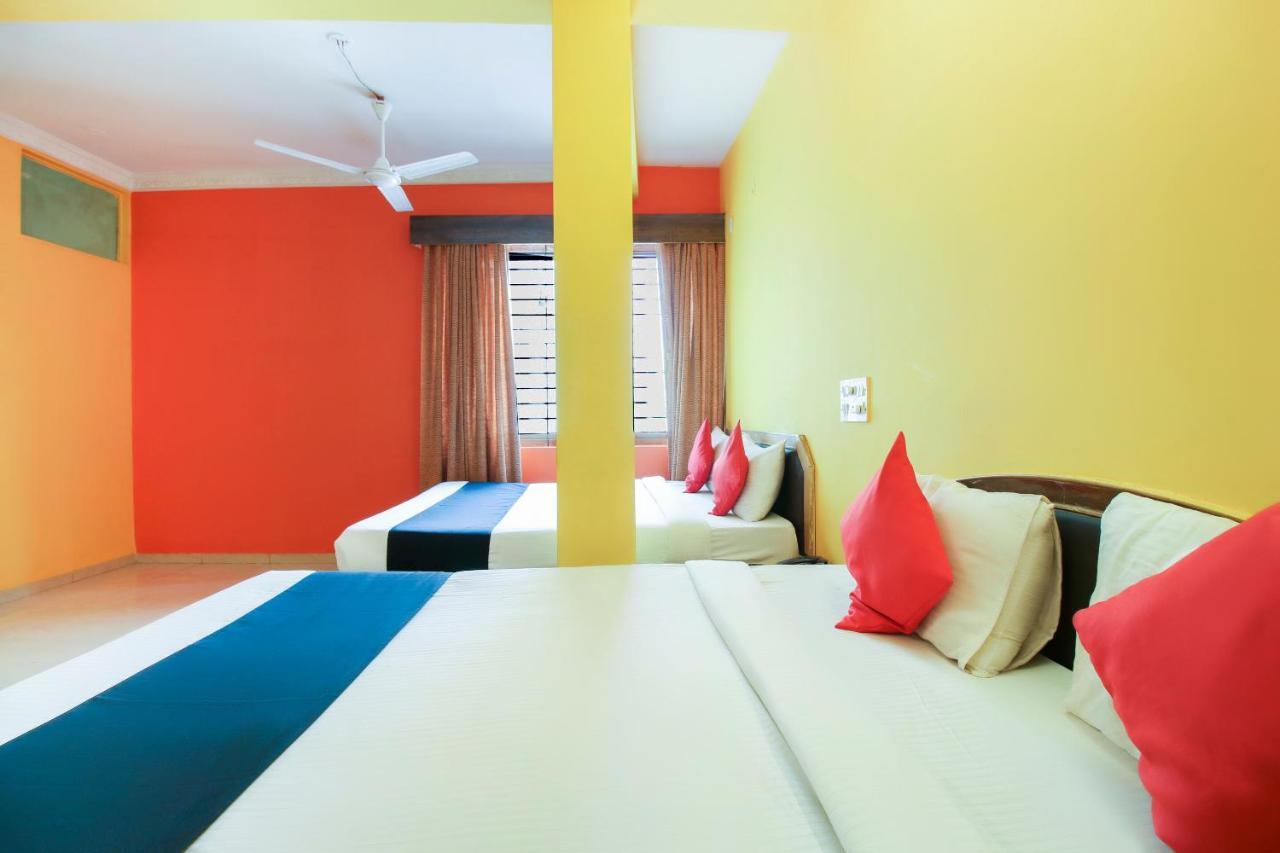 Capital O 71729 Lucky Inn Bangalore Extérieur photo