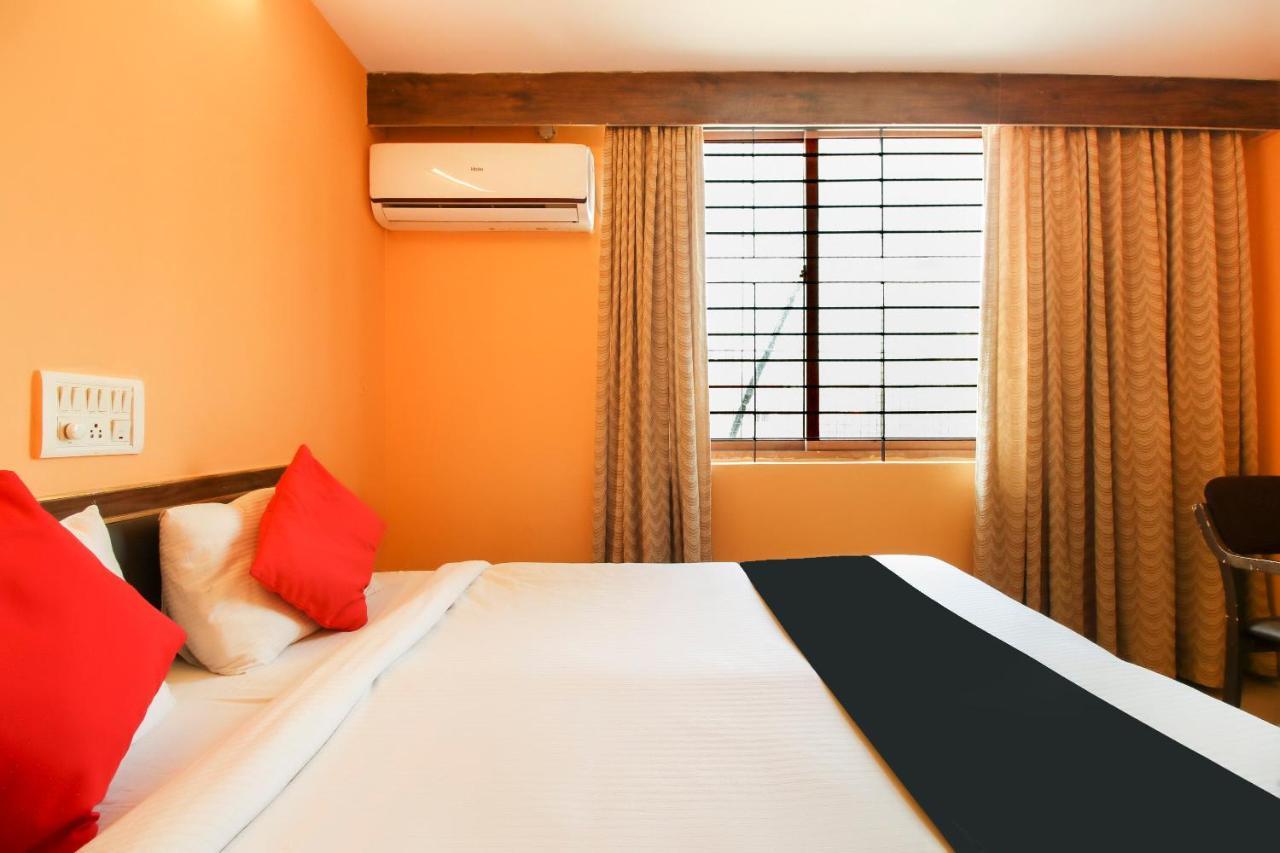 Capital O 71729 Lucky Inn Bangalore Extérieur photo