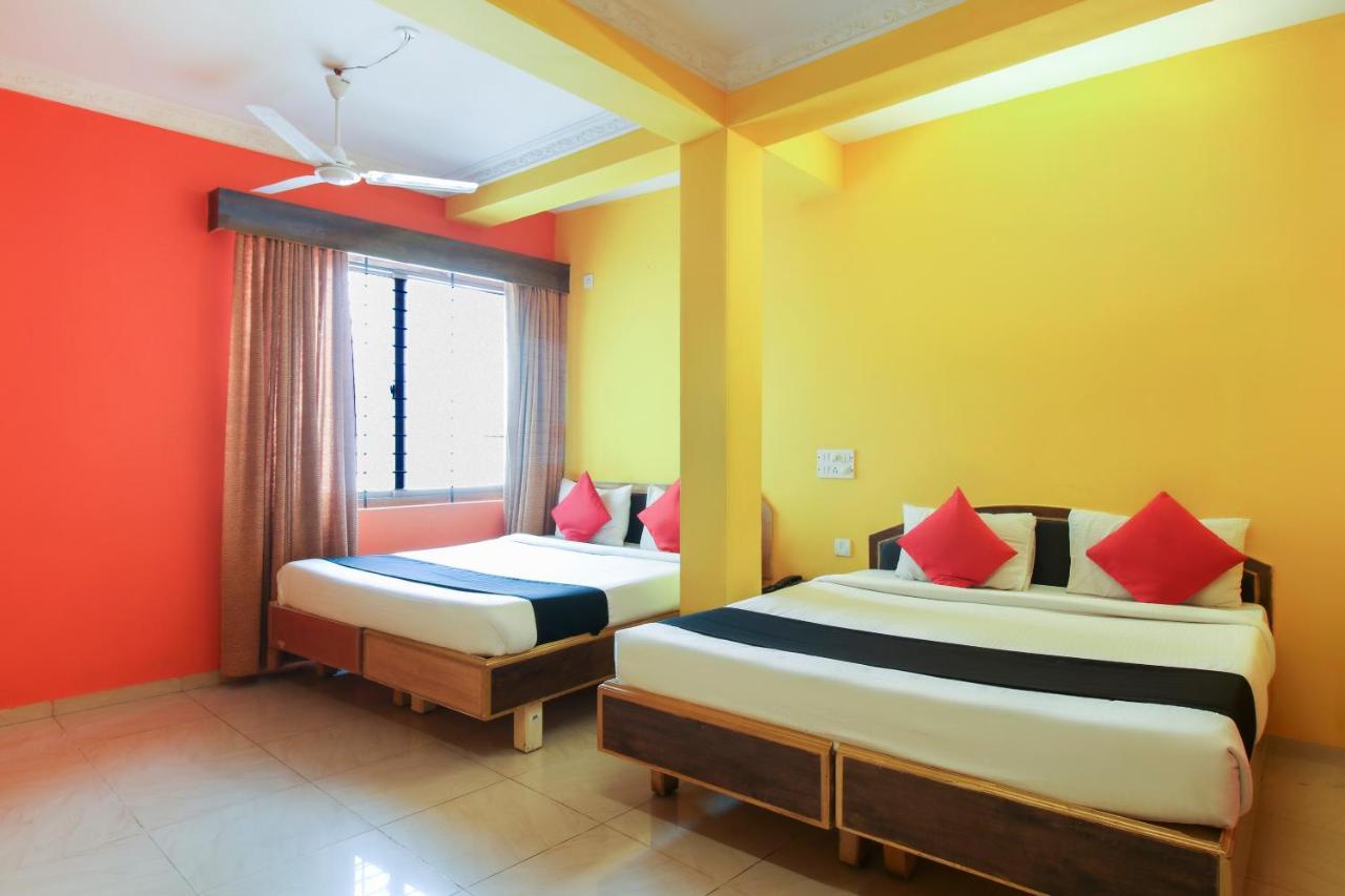 Capital O 71729 Lucky Inn Bangalore Extérieur photo
