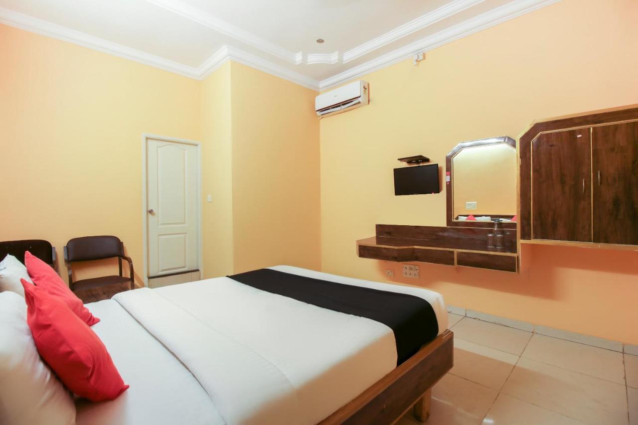 Capital O 71729 Lucky Inn Bangalore Extérieur photo