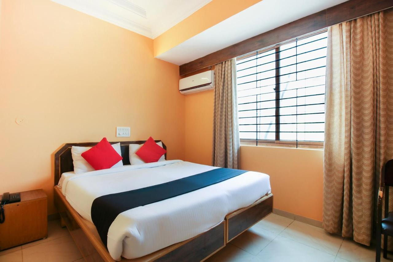 Capital O 71729 Lucky Inn Bangalore Extérieur photo